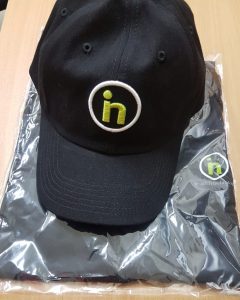 branded Tour t-shirt and cap
